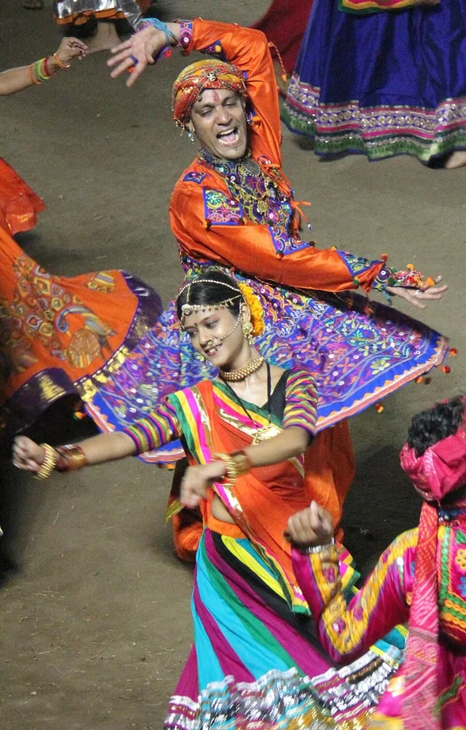 Garba dancers in colourful traditional clothing performing during Navratri in Vadodara