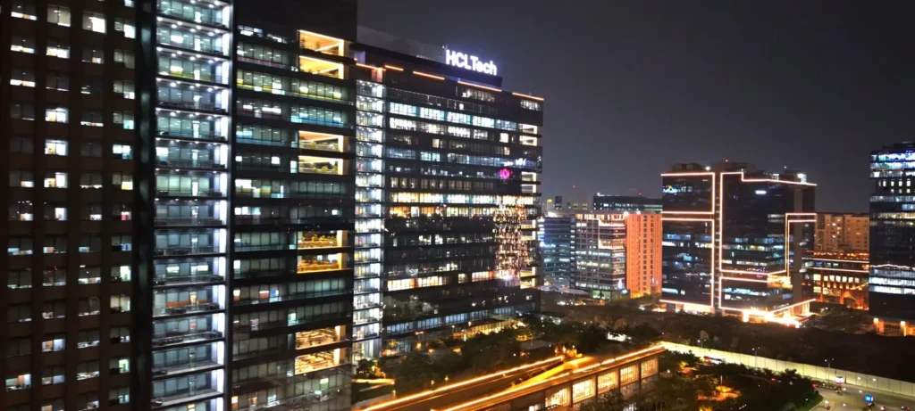 Hyderabad HITEC City skyline at night with illuminated office towers and urban infrastructure